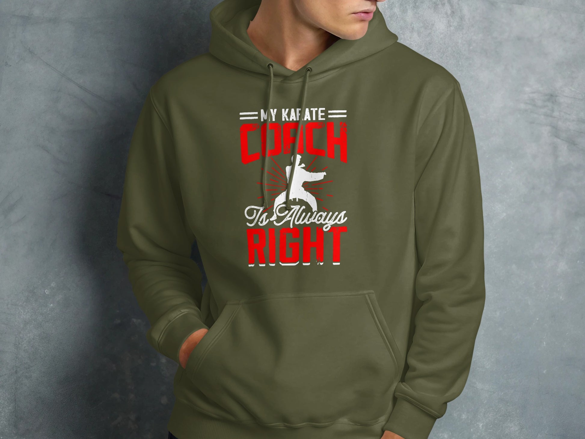Green hoodie with "My Karate Coach is Always Right" text and karate silhouette.