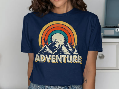 Navy t-shirt with retro mountain sunset graphic and "ADVENTURE" text.