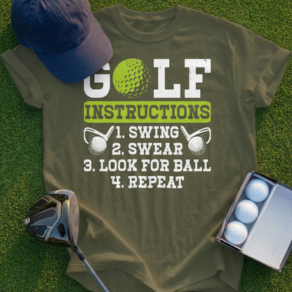 Green t-shirt with "GOLF INSTRUCTIONS: 1. SWING 2. SWEAR 3. LOOK FOR BALL 4. REPEAT" text.