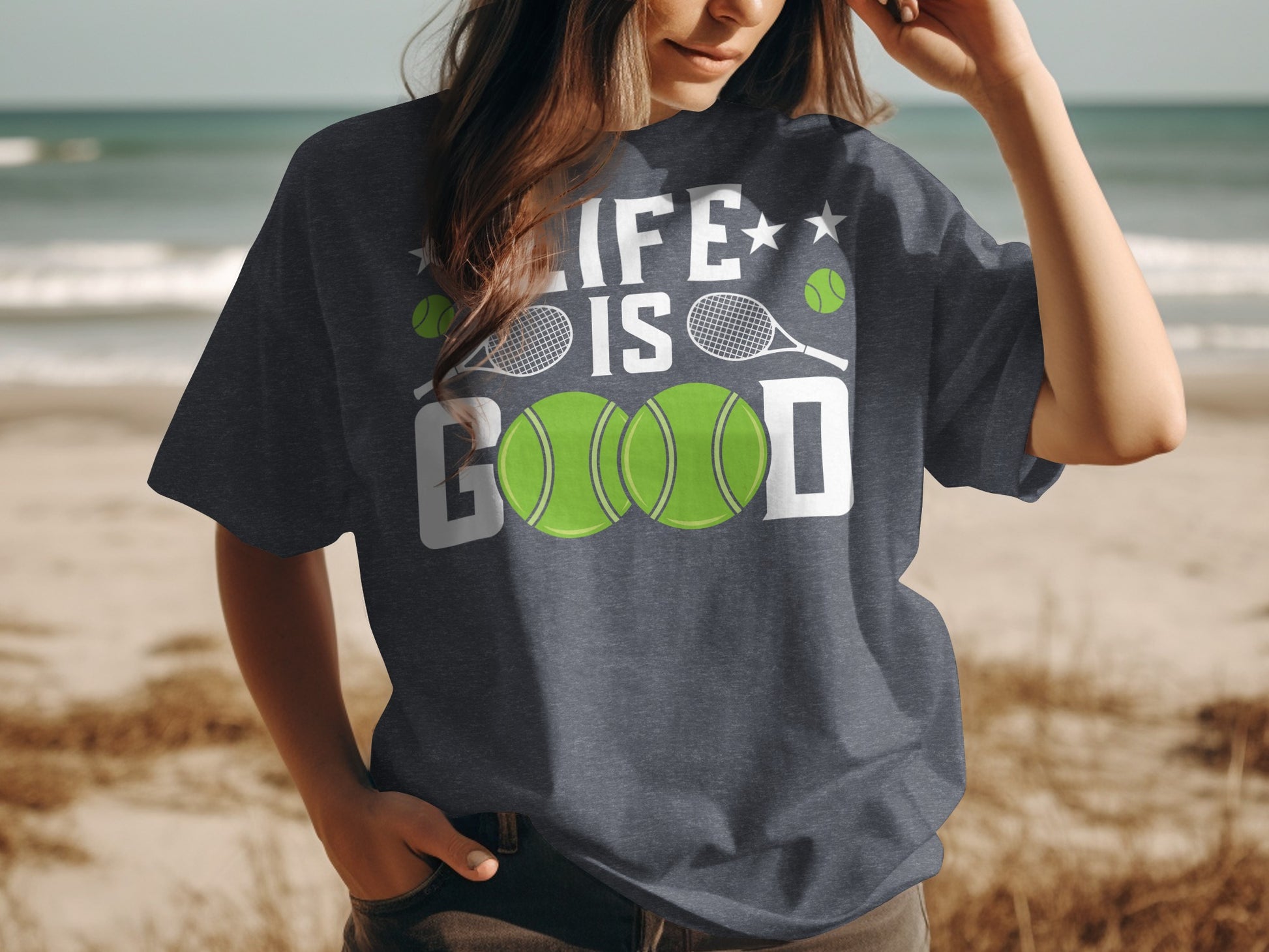 Dark grey t-shirt with "LIFE IS GOOD" and two tennis balls.