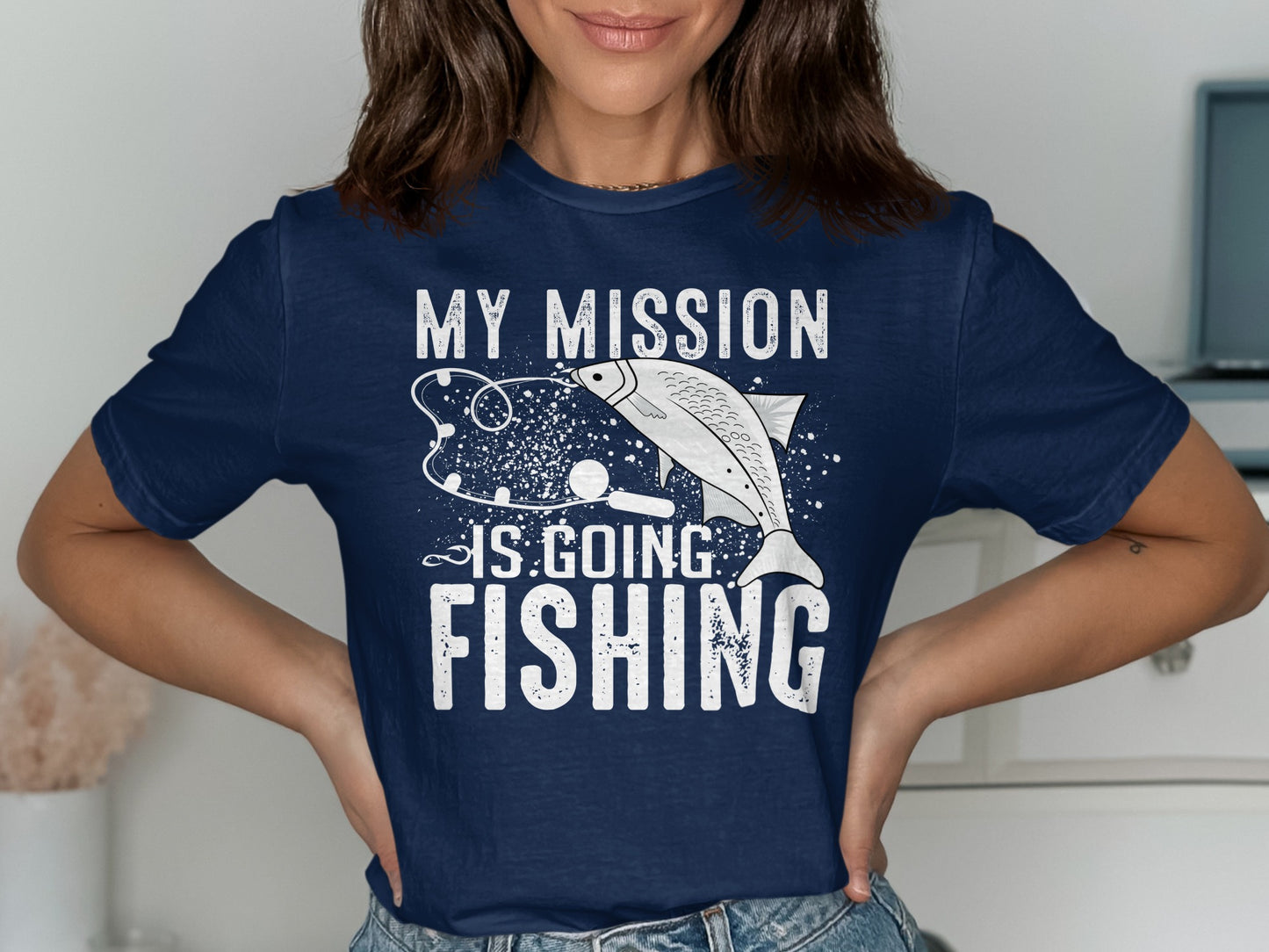Navy t-shirt with "My mission is going fishing" text and fish graphic.