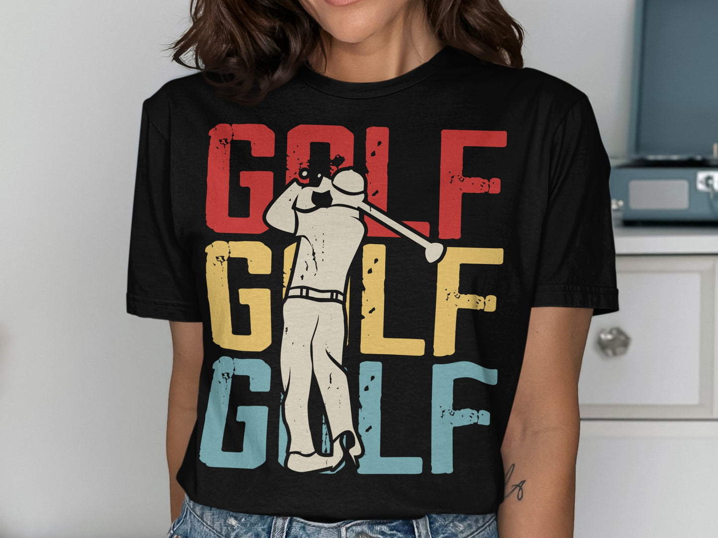 T-shirt with vintage golfer and "GOLF" in red, yellow, and blue.