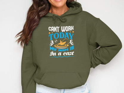 Olive green hoodie with graphic text "CAN'T WORK TODAY MY ARM IS IN A CAST".
