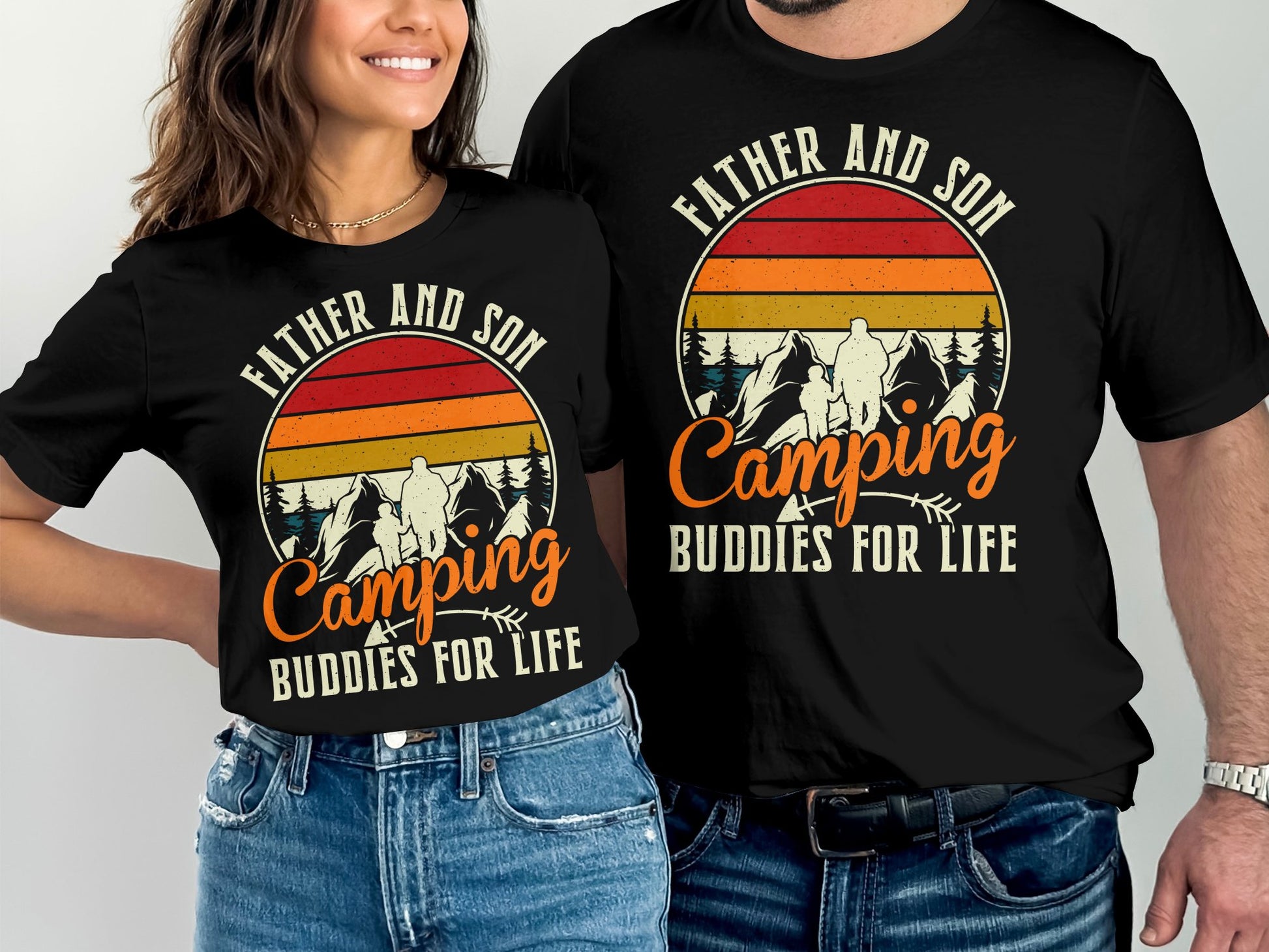 Father and son camping buddies for life graphic on black t-shirts.
