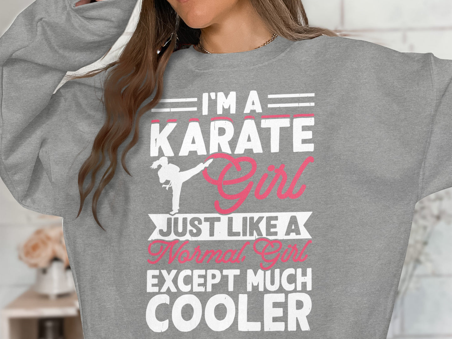 Gray sweatshirt with text "I'm a karate girl, just like a normal girl, except much cooler".