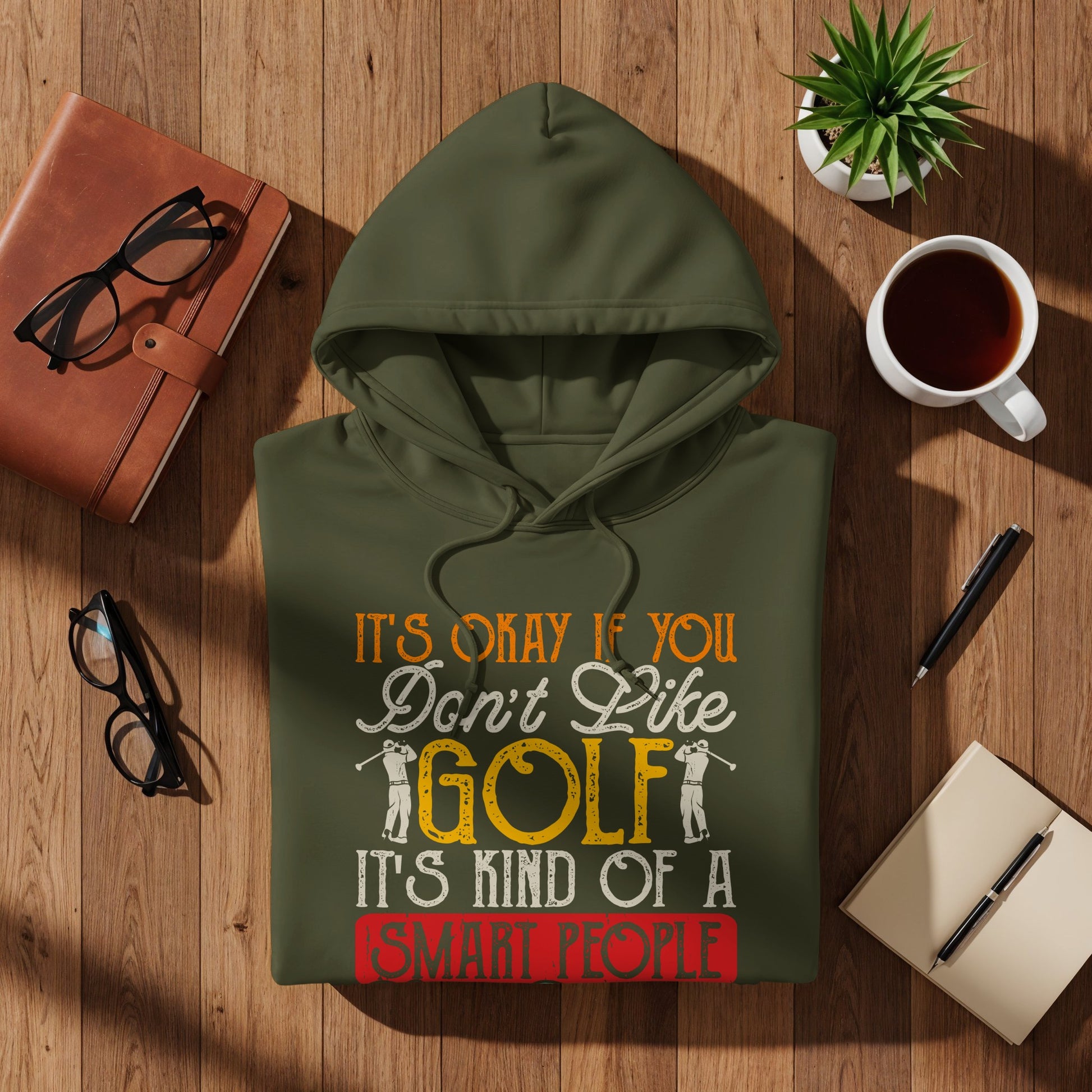 Olive green hooded sweatshirt with "It's okay if you don't like golf it's kind of a smart people" text.