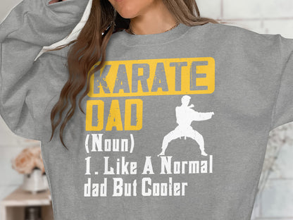 Grey sweatshirt with "Karate Dad (Noun) 1. Like a Normal Dad But Cooler" graphic.