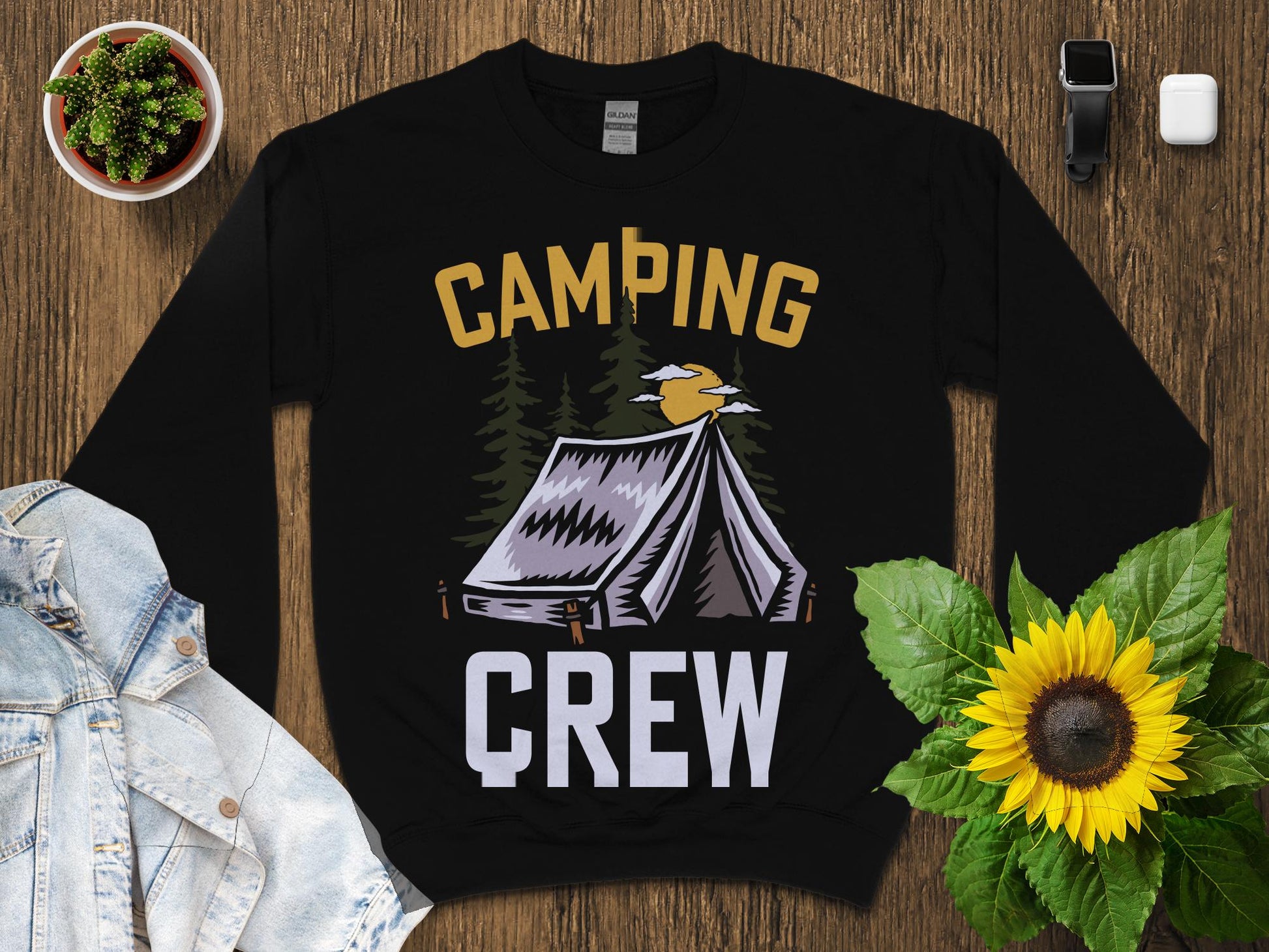 Black sweatshirt with "Camping Crew" and a tent graphic.