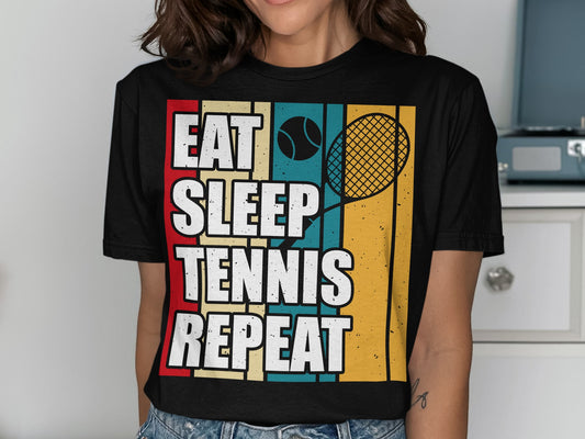 T-shirt with "EAT SLEEP TENNIS REPEAT" text and tennis racket graphic.