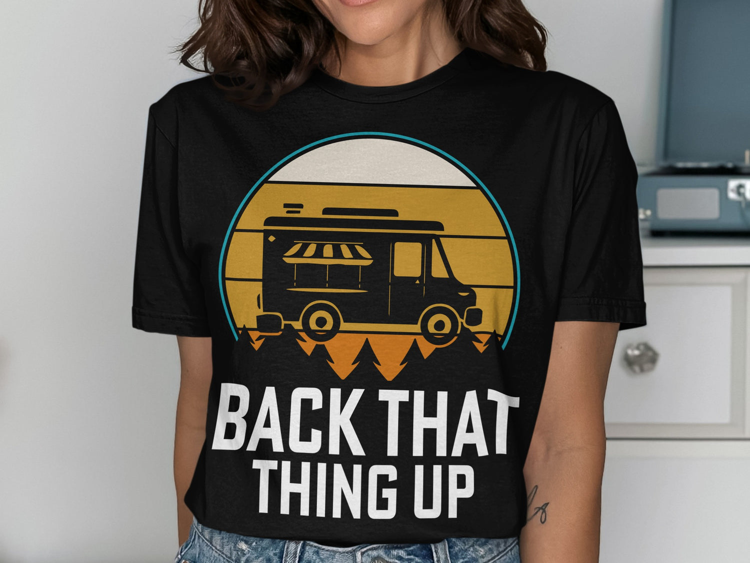 Black t-shirt with a retro food truck graphic and "BACK THAT THING UP" text.