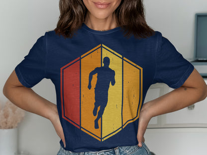 Navy t-shirt with a hexagon graphic of a runner in warm gradient colors.
