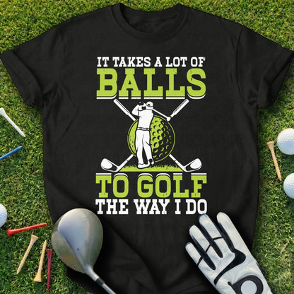 Black t-shirt with "IT TAKES A LOT OF BALLS TO GOLF THE WAY I DO" and golf graphic.