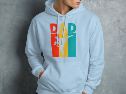 Light blue hoodie with "DAD" logo featuring a karate silhouette.