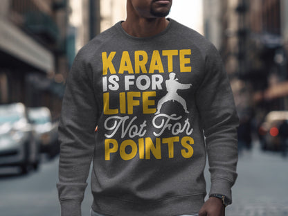 Grey sweatshirt with "Karate is life, not for points" text and karate graphic.