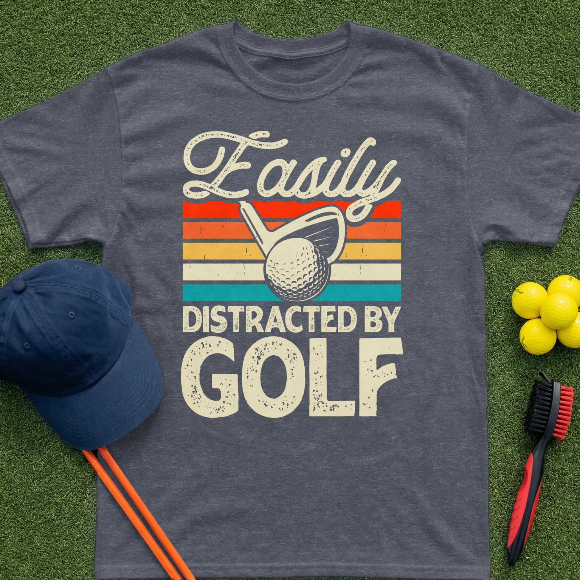 Dark grey t-shirt with "Easily Distracted By GOLF" and golf imagery.