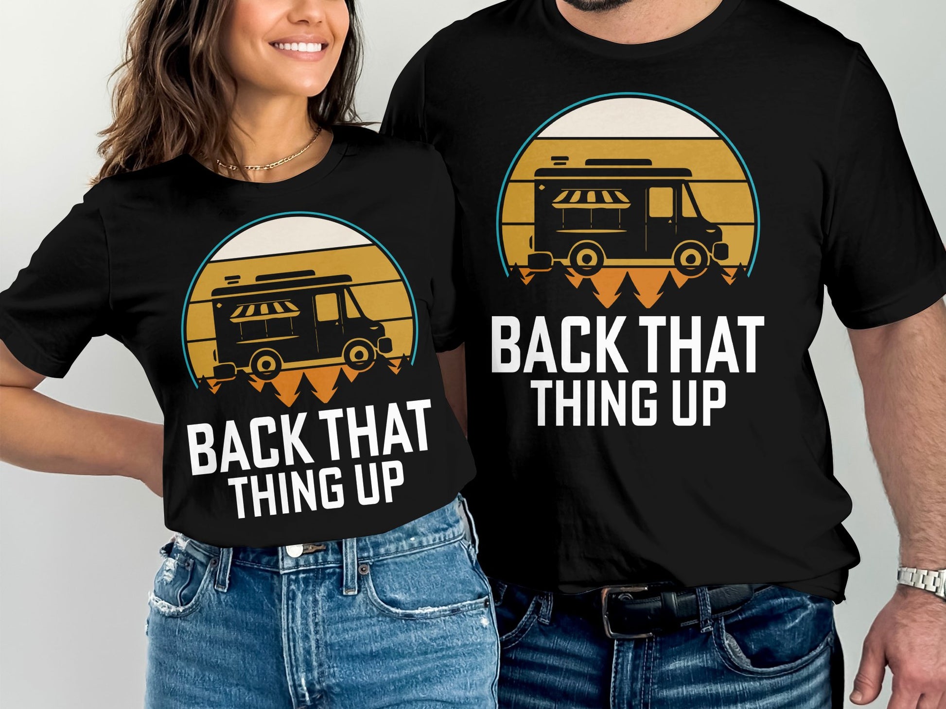 Couple wearing black t-shirts with "BACK THAT THING UP" and food truck graphic.