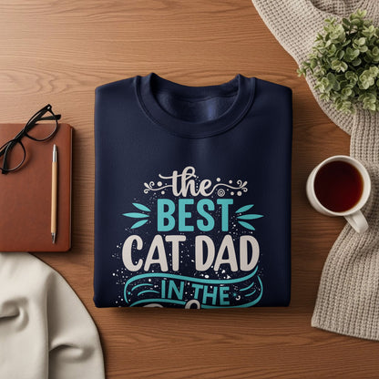 Navy sweatshirt with "the best cat dad in the" text and cat paw graphics.