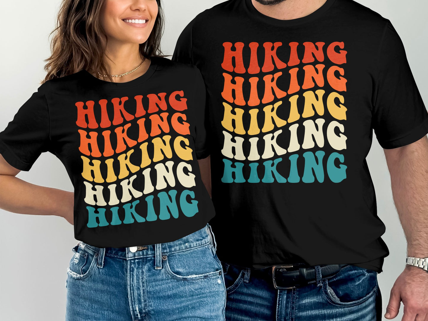 Black t-shirts with colorful "HIKING" text stacked vertically.