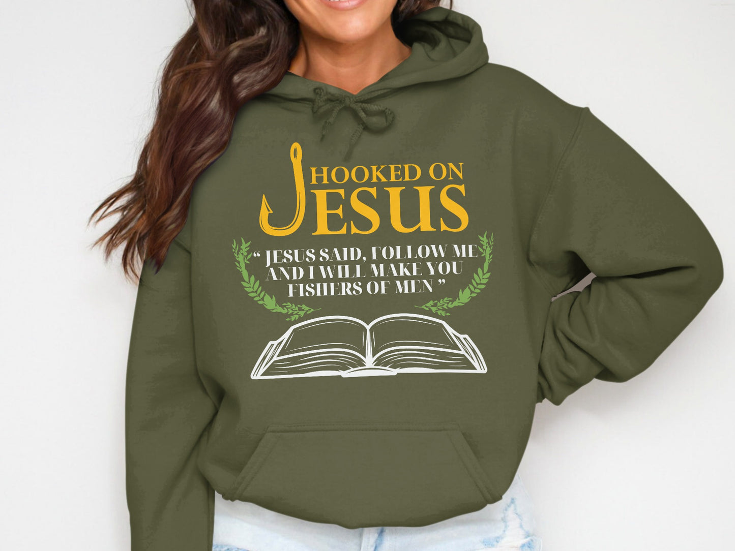 Olive green hoodie with "Hooked on Jesus" and Bible verse.