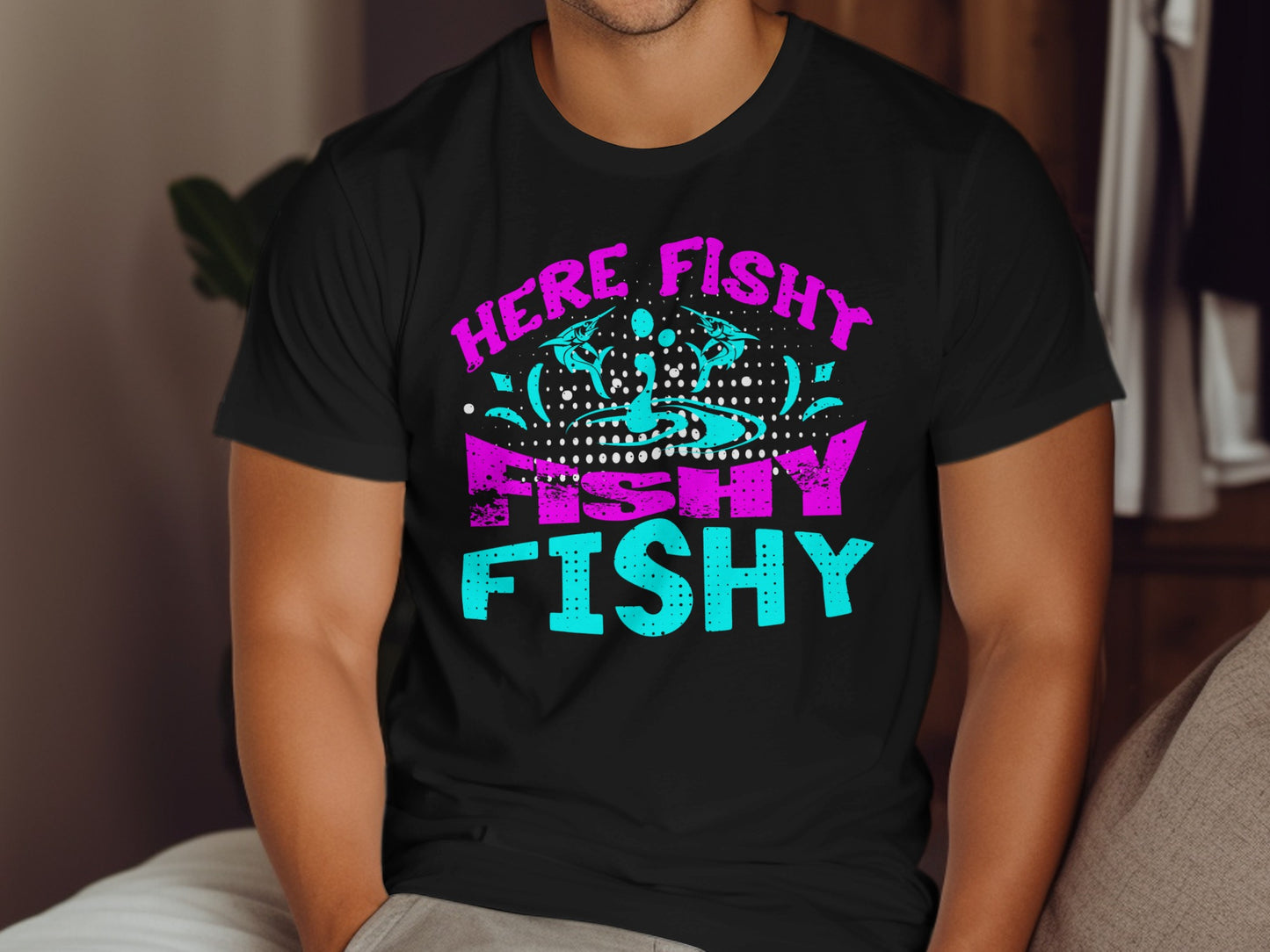 Black t-shirt with "HERE FISHY FISHY" in pink and blue neon text.