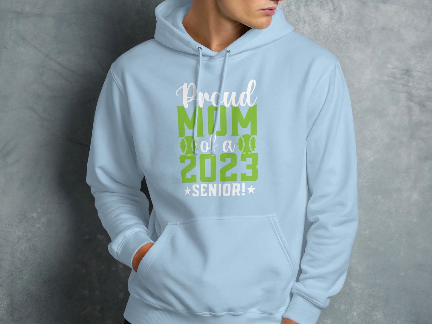 Light blue hoodie with "Proud Mom 2023 Senior!" text and tennis balls.