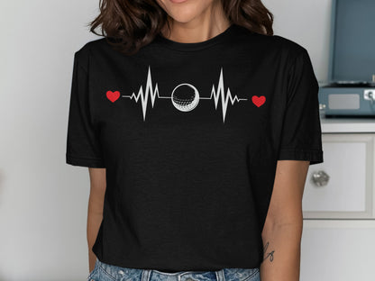 Black t-shirt with golf ball and heartbeat graphic.
