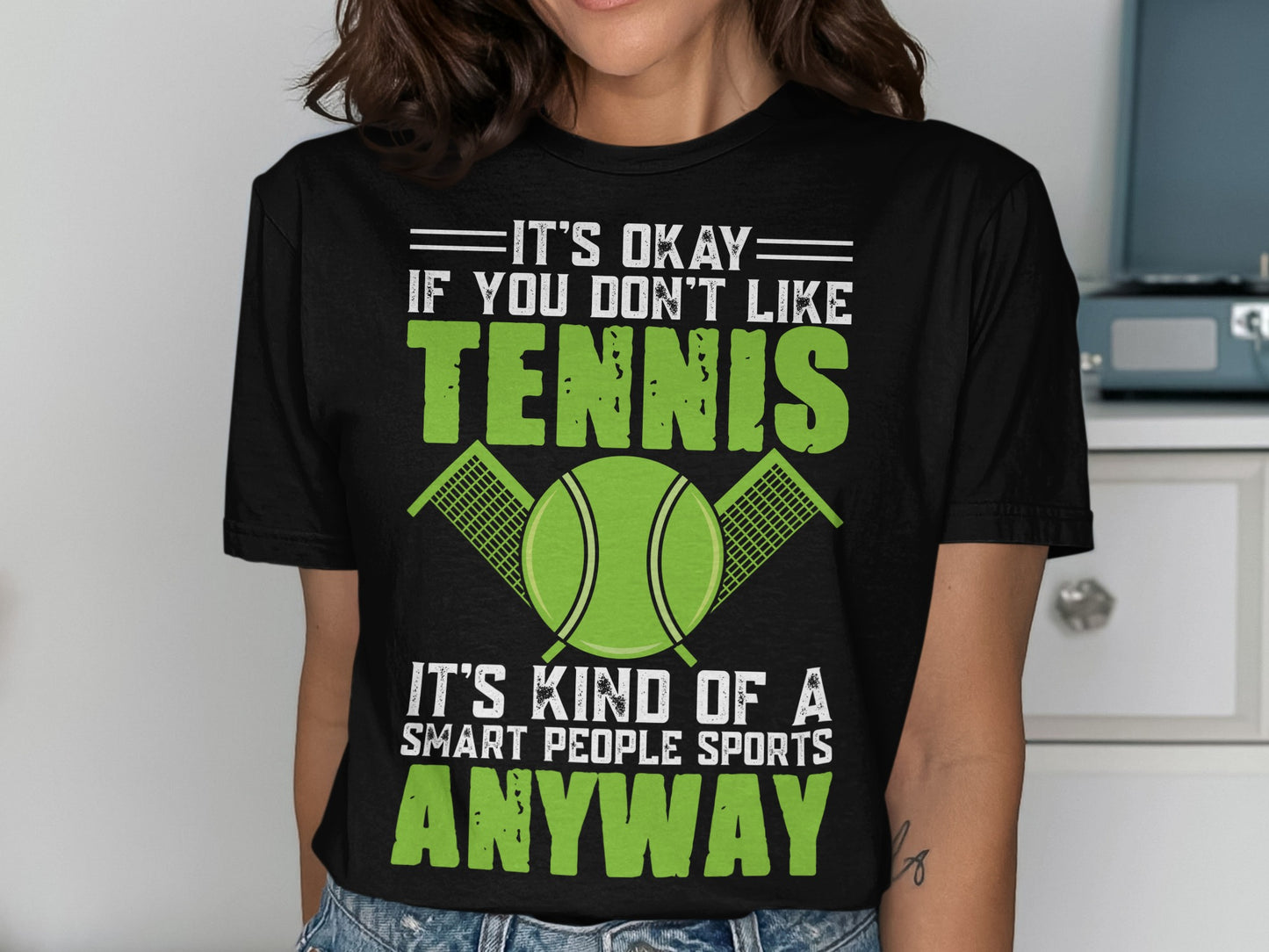 Black t-shirt with "It's okay if you don't like tennis" and "smart people sports".