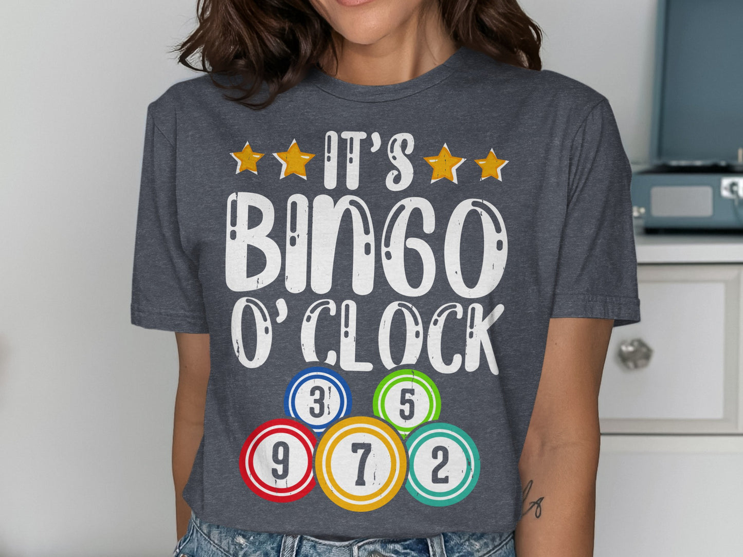 Dark gray t-shirt with "It's Bingo O'Clock" and bingo balls.