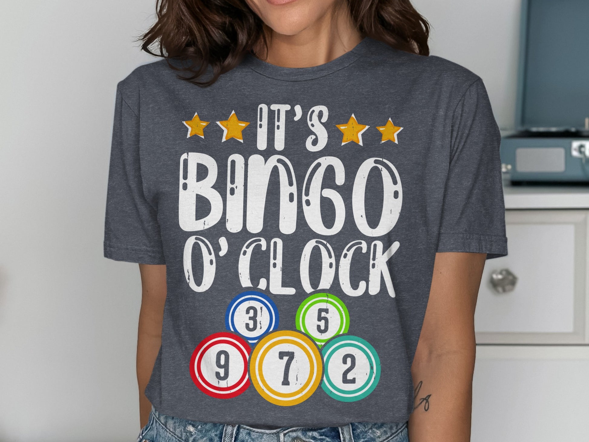 Dark gray t-shirt with "It's Bingo O'Clock" and bingo balls.