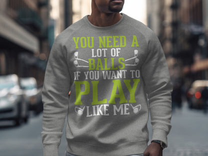 Grey sweatshirt with text "You need a lot of balls if you want to play like me".