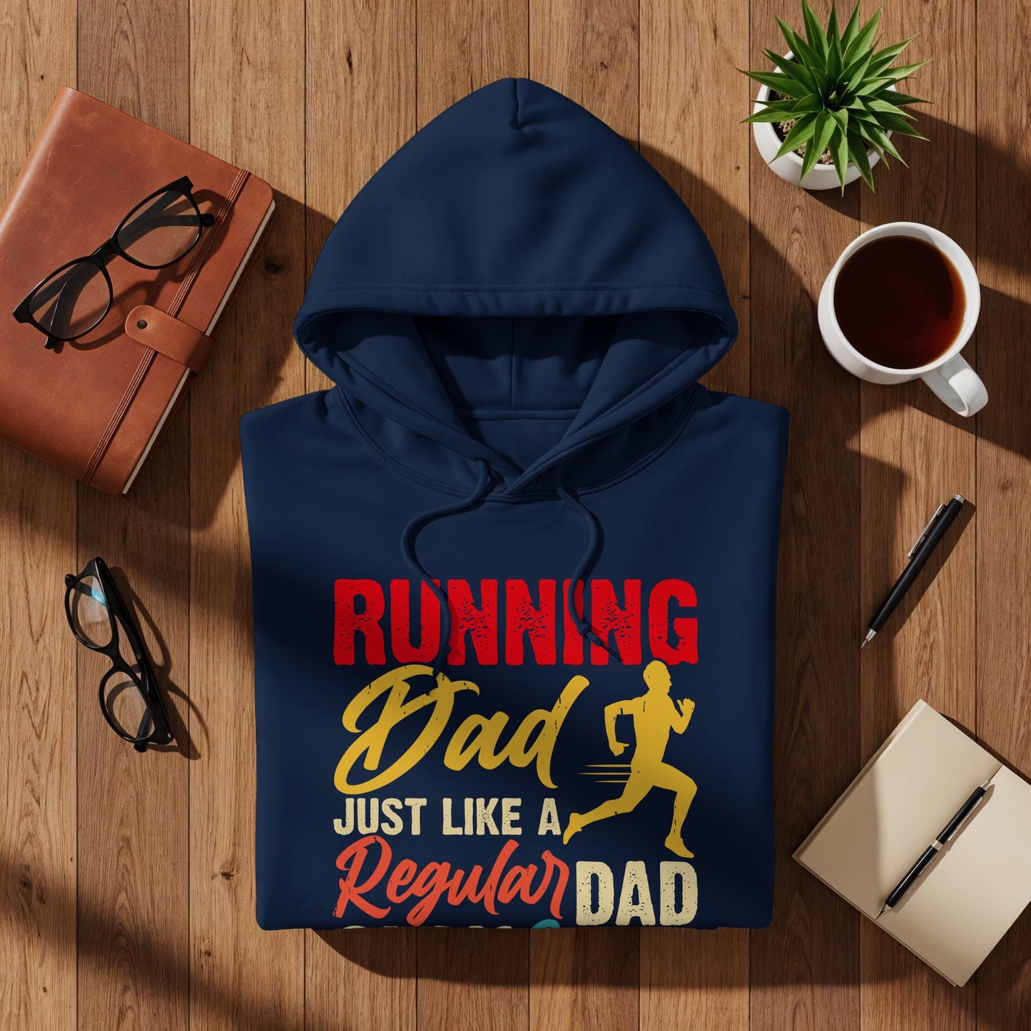 Navy blue hoodie with "Running Dad Just Like a Regular Dad" text and running graphic.