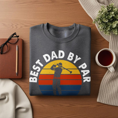 Dark grey t-shirt with "Best Dad by Par" text and a golfer at sunset graphic.