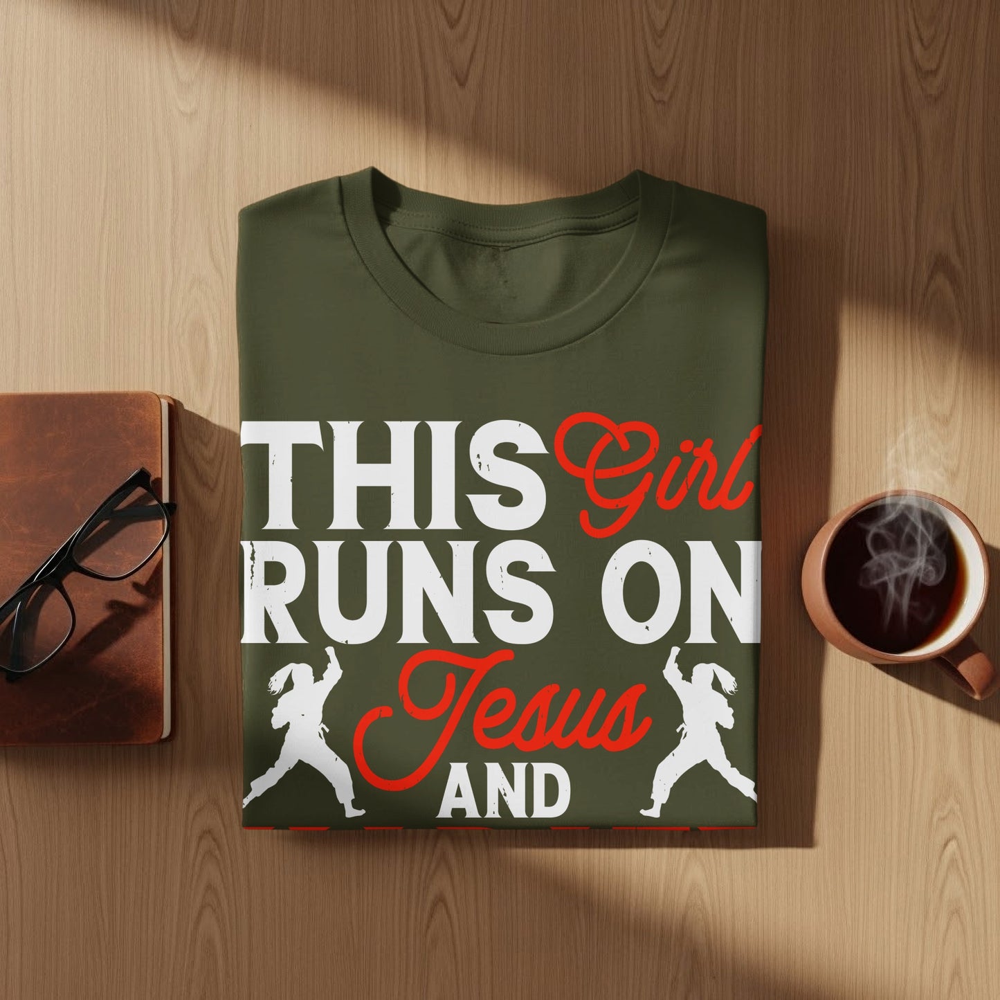 Olive green t-shirt with "THIS Girl RUNS ON Jesus AND" text and two running figures.