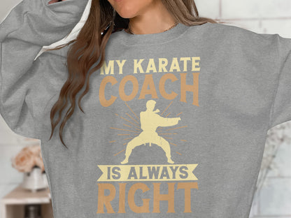 Gray sweatshirt with "My Karate Coach Is Always Right" text and martial artist graphic.