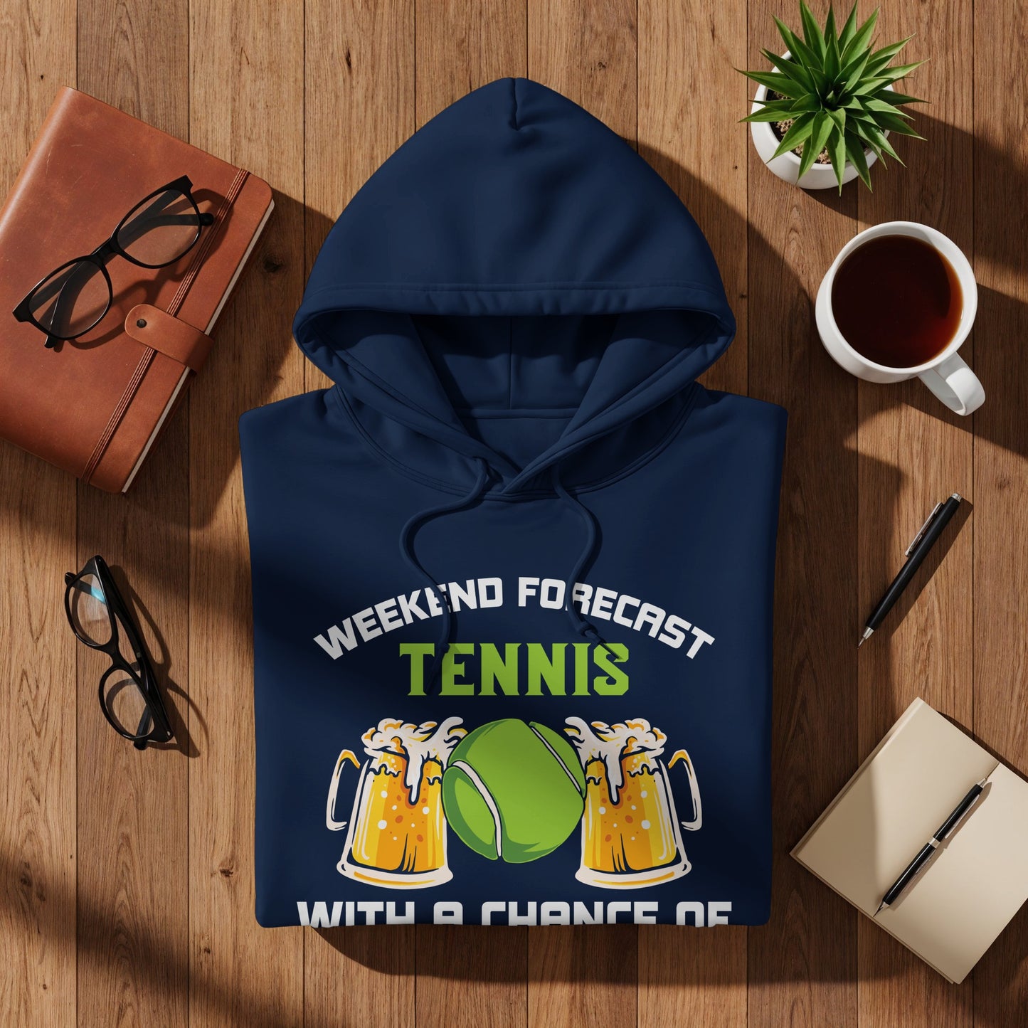 Navy hoodie with "Weekend Forecast: Tennis" graphic featuring tennis balls and beer mugs.