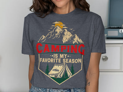 Graphic t-shirt with mountains, tent, and "Camping is my favorite season" text.