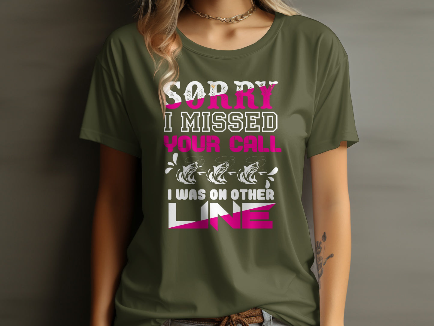 Olive green t-shirt with "Sorry I Missed Your Call" and fishing imagery.