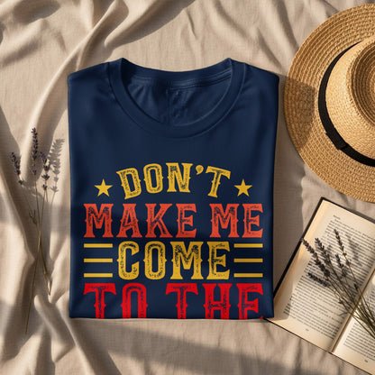 Dark blue t-shirt with "DON'T MAKE ME COME TO THE" text in red, yellow, and orange.