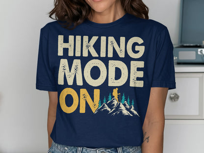 Navy t-shirt with "Hiking Mode On" text and mountain graphic.