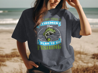 Dark t-shirt with text "I DO HAVE A RETIREMENT PLAN, I PLAN TO GO FISHING" and fish graphic.