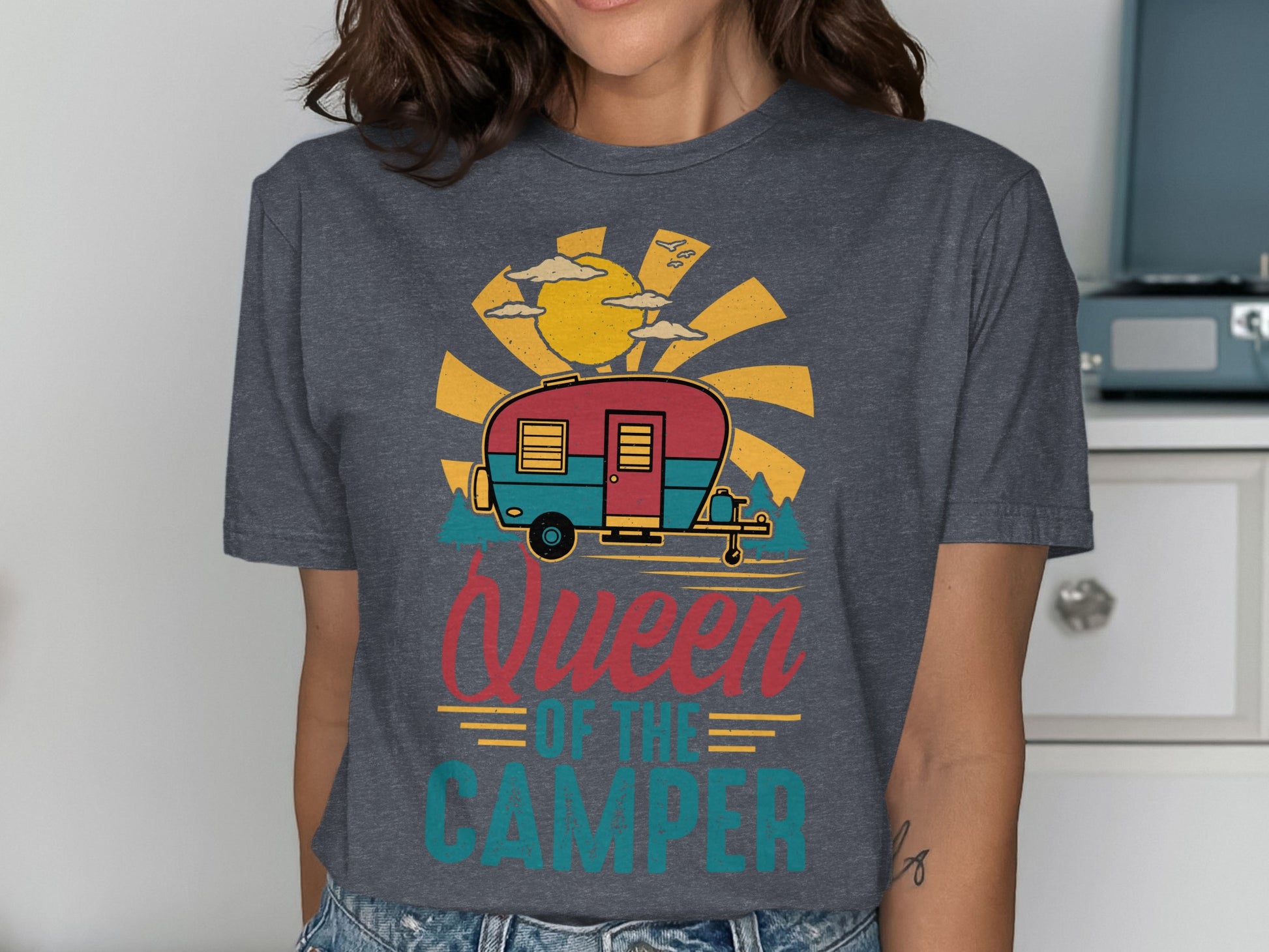 Queen of the Camper graphic tee with sun and caravan illustration.