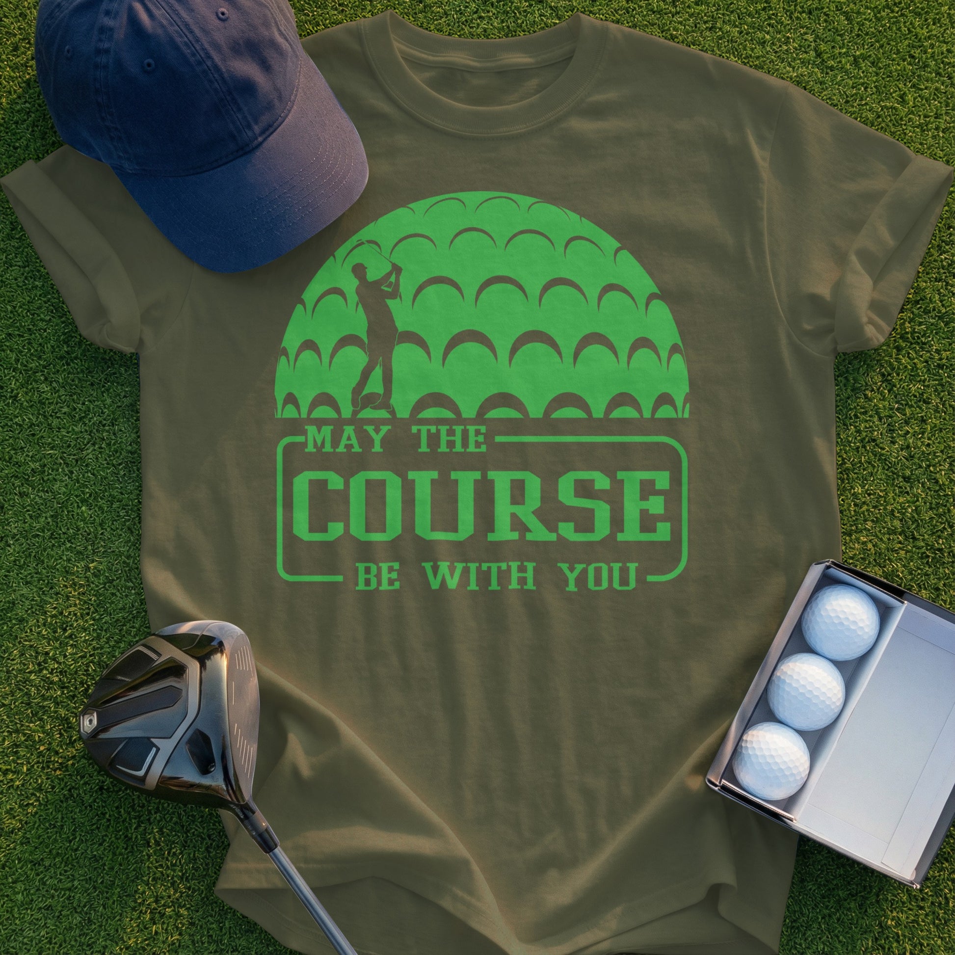 Olive green t-shirt with "May the course be with you" golf graphic.