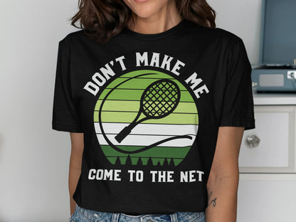 Black t-shirt with white text "DON'T MAKE ME COME TO THE NET" and tennis racket graphic.