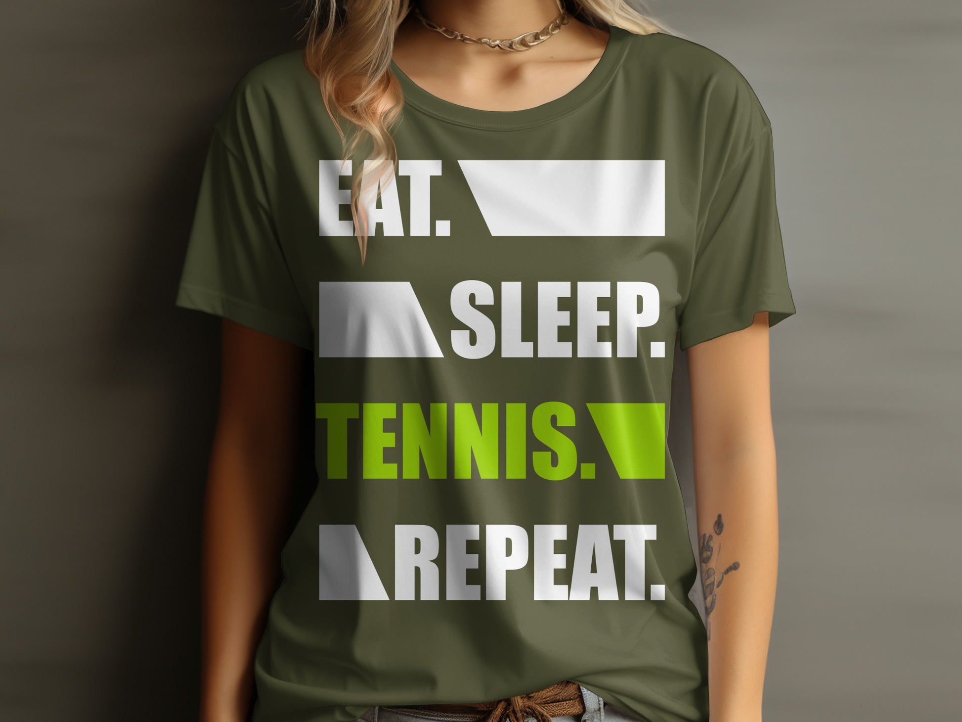 Green t-shirt with "Eat. Sleep. Tennis. Repeat." text in white and green.