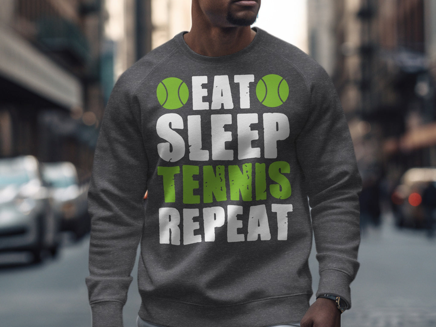Grey sweatshirt with "EAT SLEEP TENNIS REPEAT" graphic and green tennis balls.