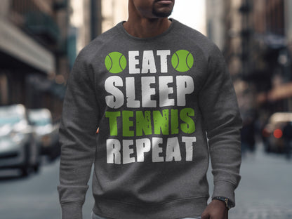 Grey sweatshirt with "EAT SLEEP TENNIS REPEAT" graphic and green tennis balls.