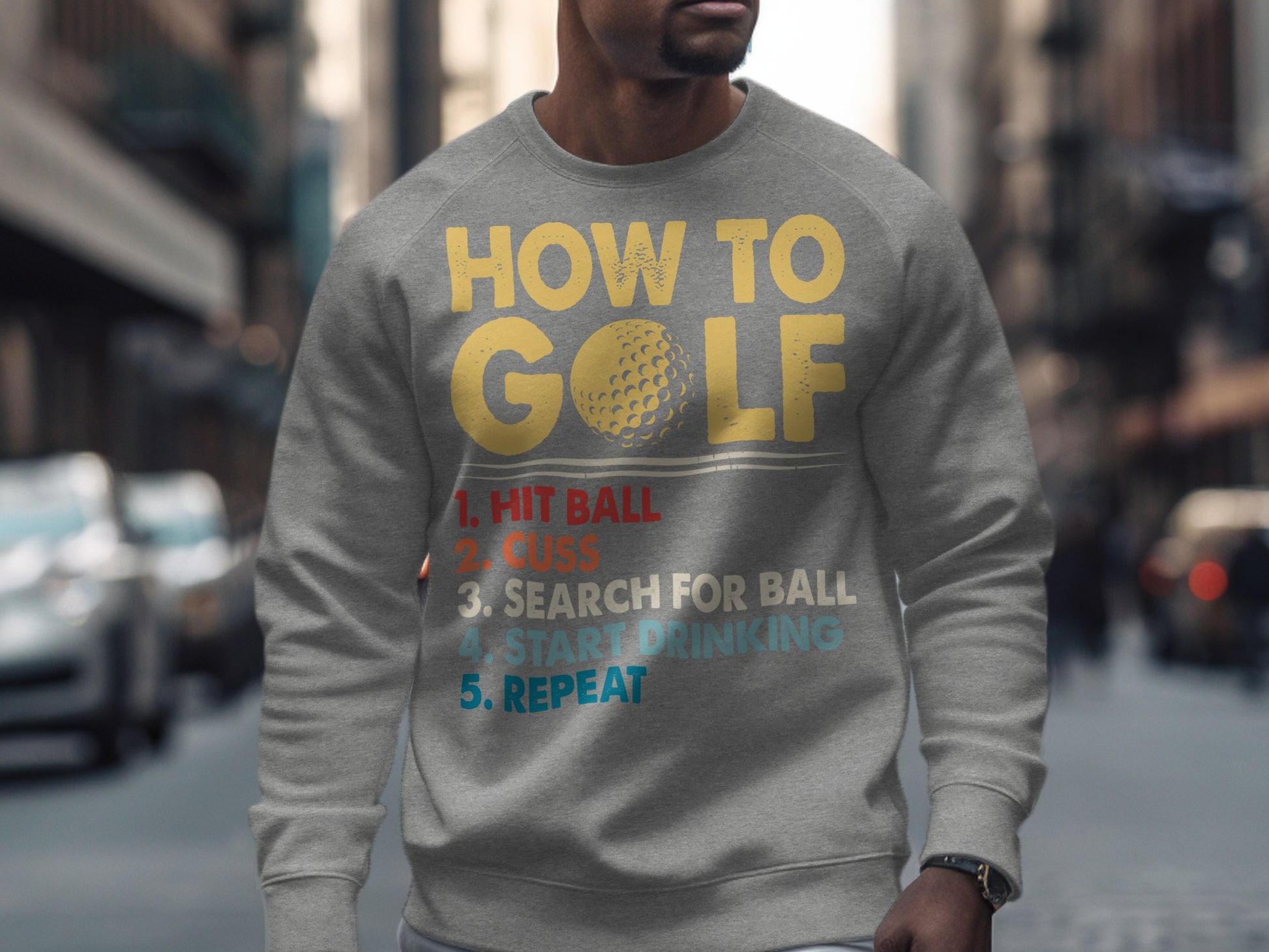 Gray sweatshirt with "How to Golf" and a five-step humorous list.