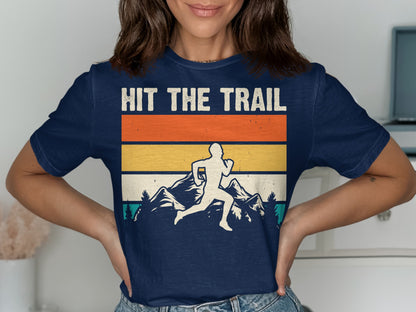 Navy t-shirt with "Hit the Trail" text and mountain runner graphic.