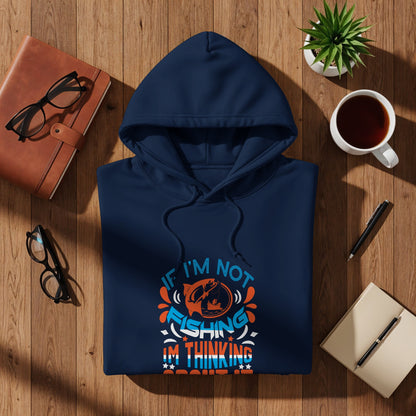 Navy blue hoodie with "If I'm not fishing I'm thinking about fishing" text and graphic.