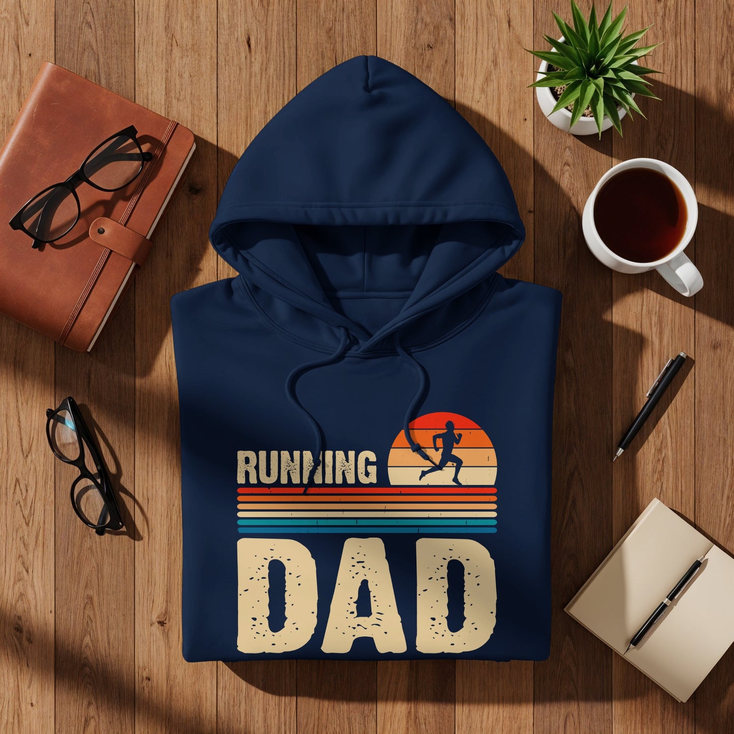 Navy hoodie with "Running Dad" text and sunset graphic.